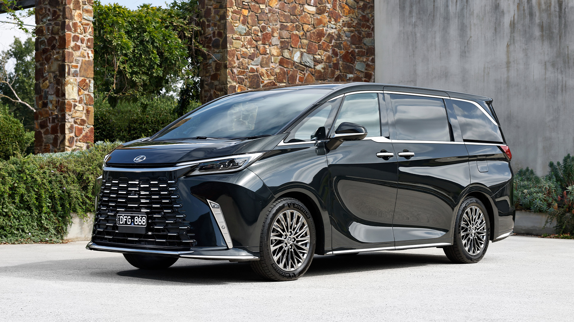 A black Lexus LM mover