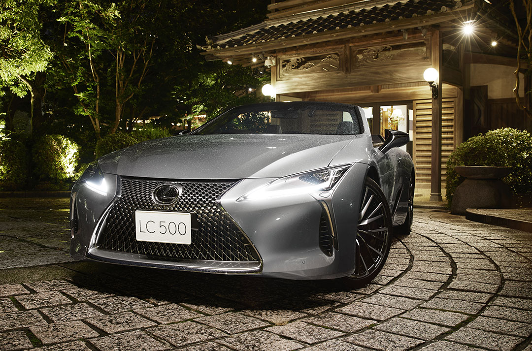 Lexus LC Convertible with at night parked in a driveway