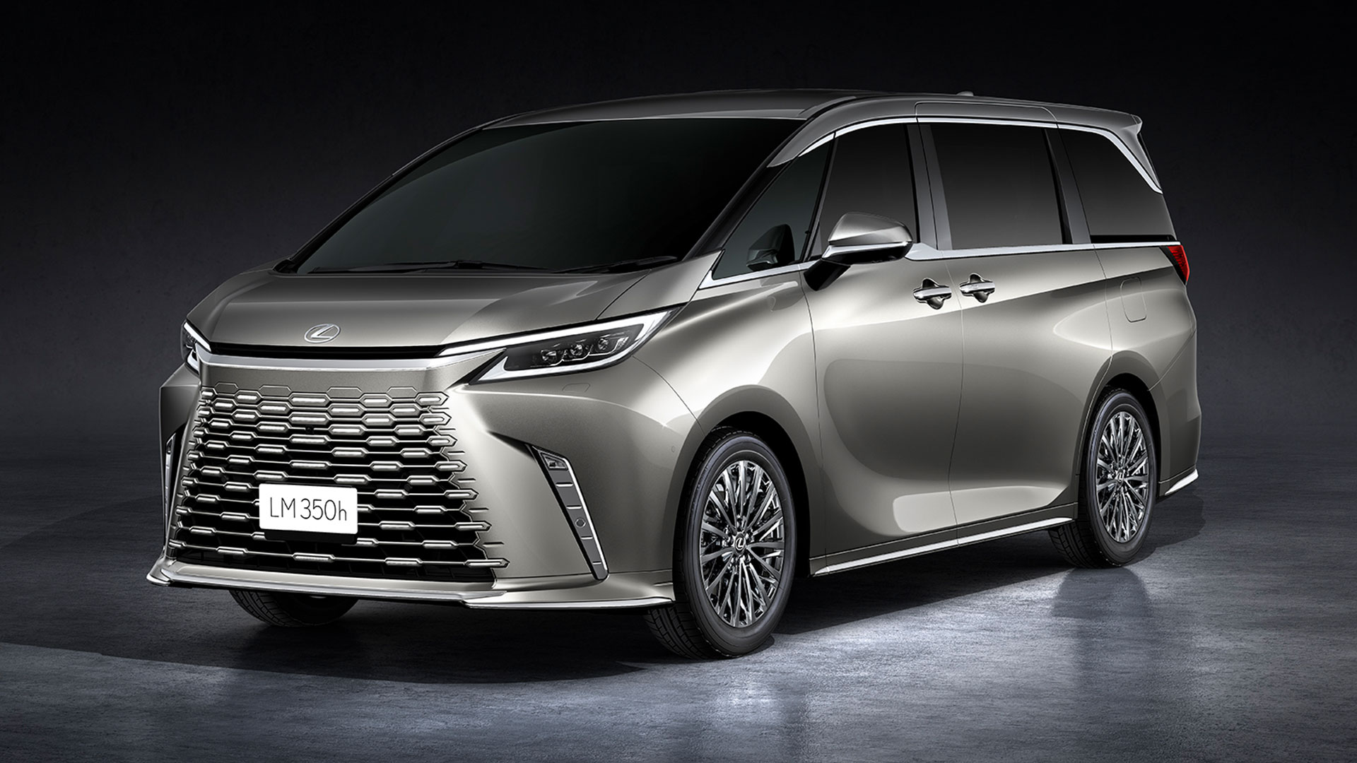 An angled view of the Lexus LM 350h showing both the front and side of the vehicle.