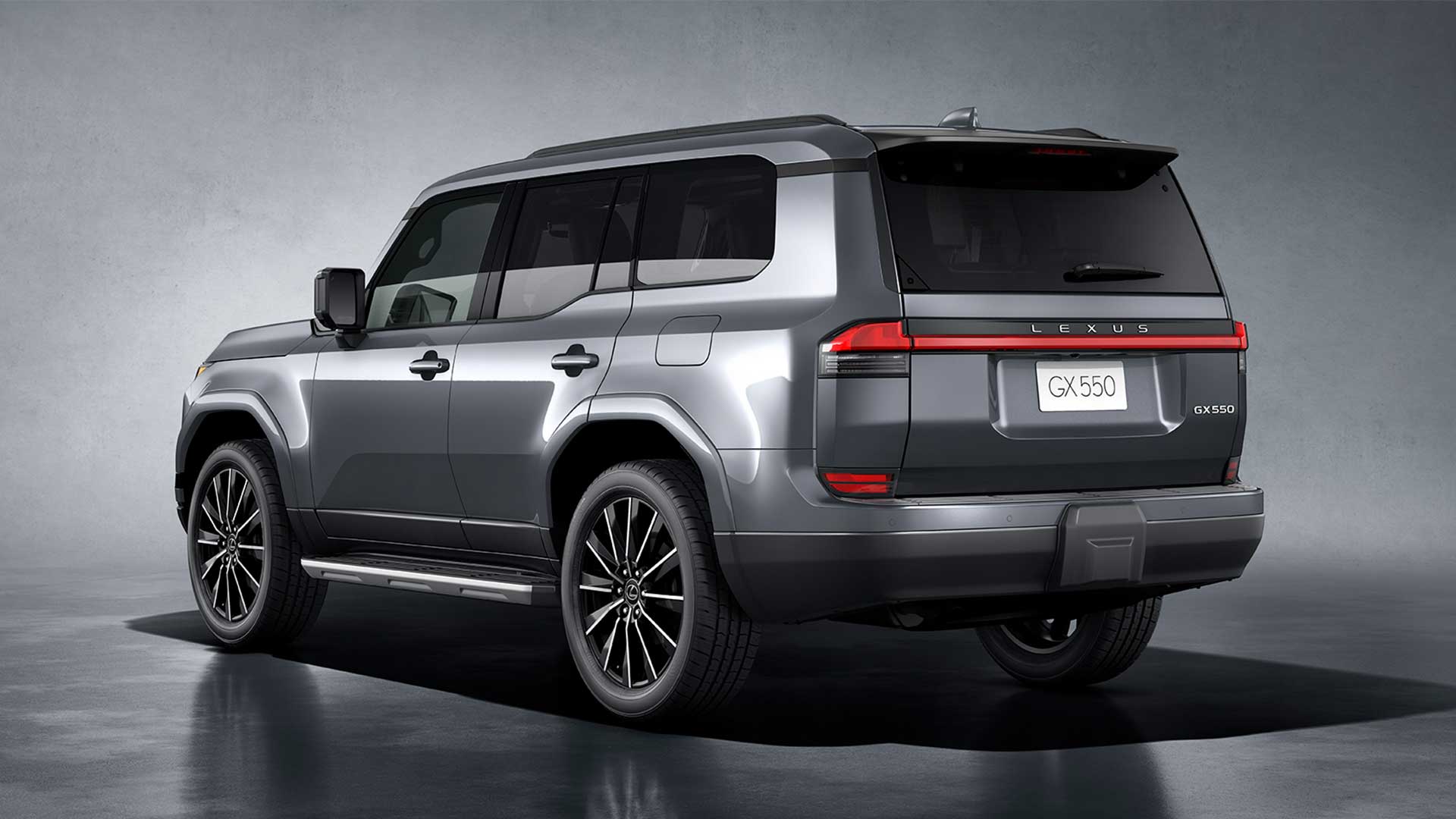 Rear side view of a dark grey Lexus GX