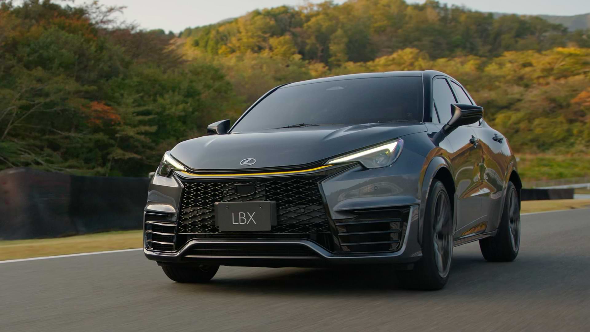 Side view of a moving car on a private track.