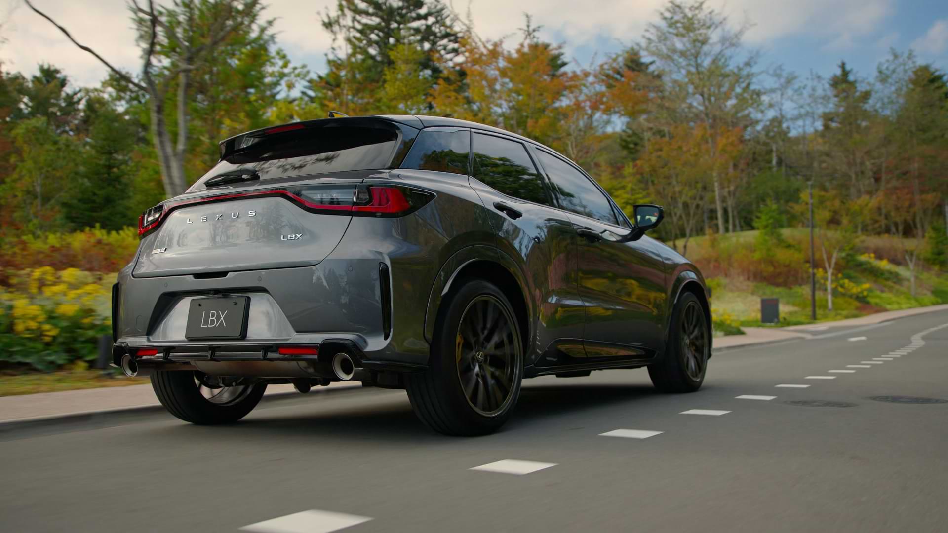 Back view of a moving car on the road.