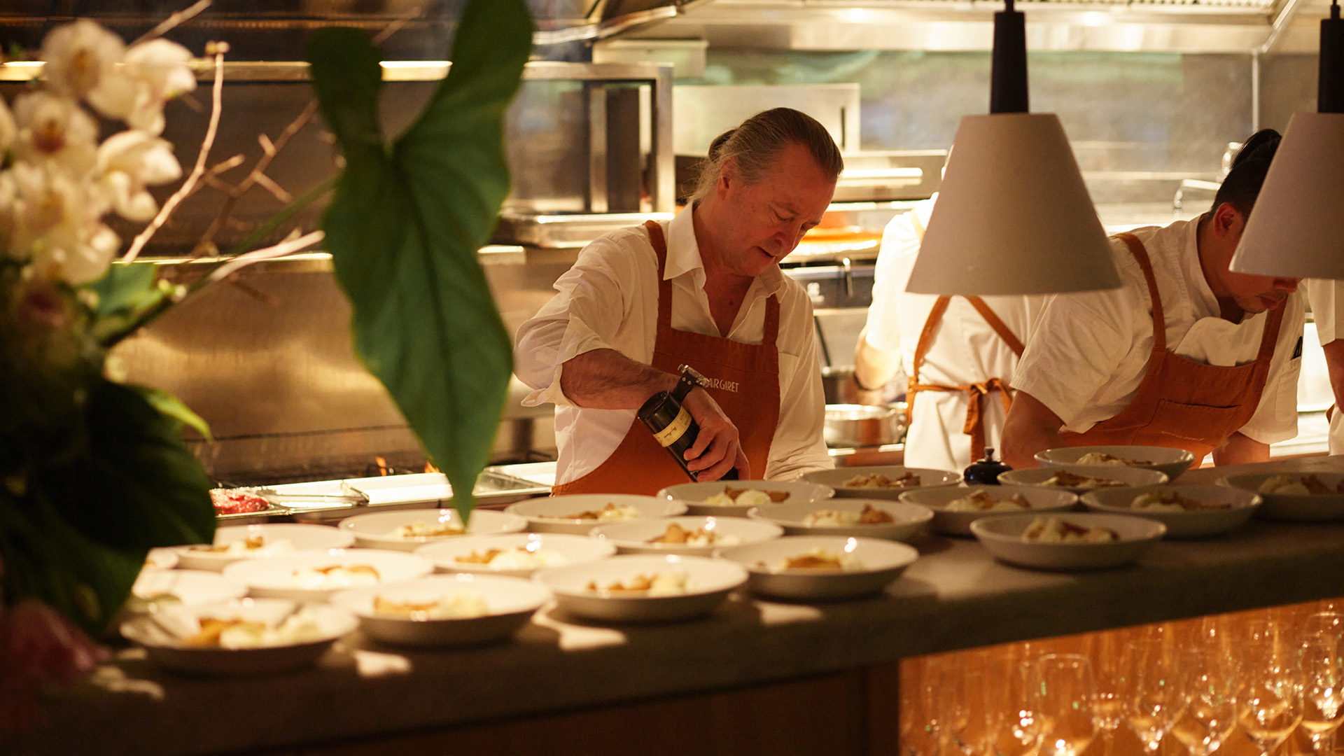 Lexus Ambassador and famed chef Neil Perry prepares meals for Lexus customers.