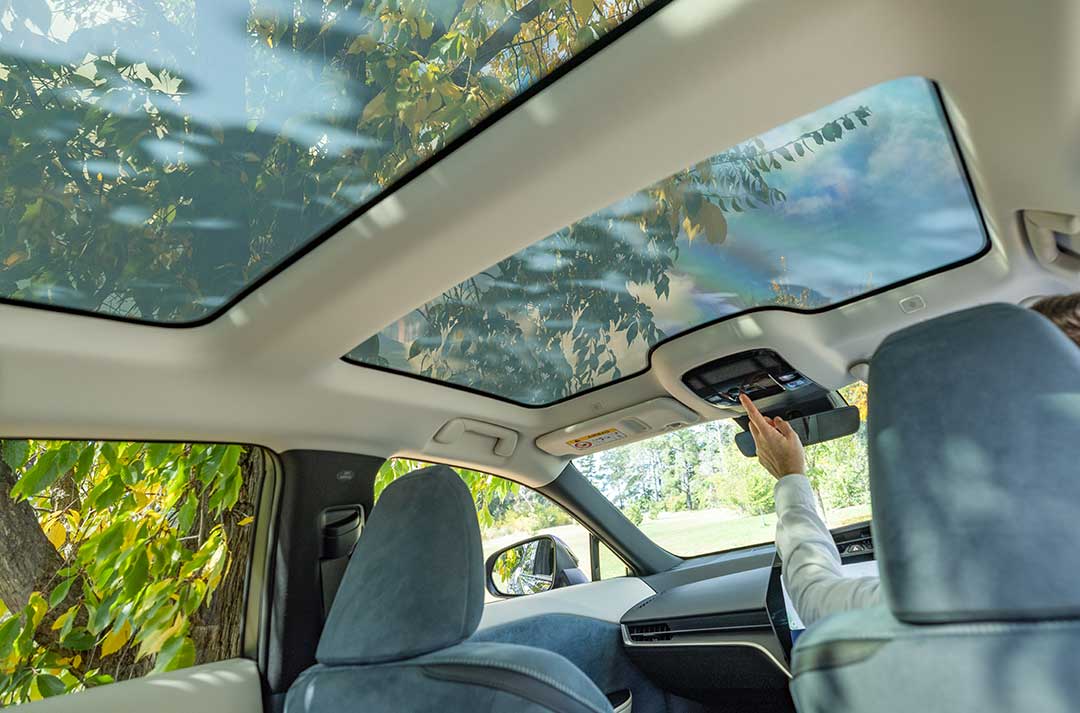 The Lexus RZ 450e Sports Luxury features many Lexus innovations, including a split panoramic roof that at the touch of a button switches the roof panels from clear to opaque to cut out UV light.